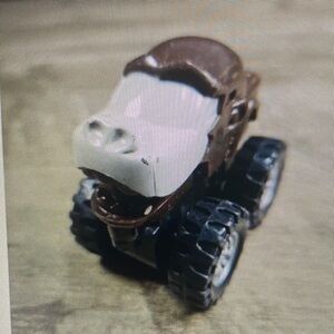 Brown and White Monster Truck Toy